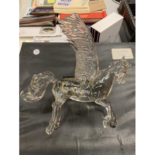 120 - A CRYSTAL GLASS SCULPTURE OF A WINGED HORSE