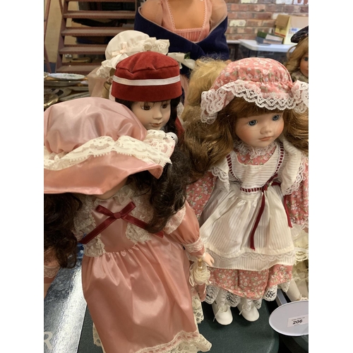 206 - AN ASSORTMENT OF DOLLS TO INCLUDE LARGE VINTAGE EXAMPLES