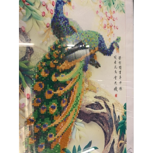 210 - A FRAMED CHINESE SILK AND BEADWORK 'PEACOCK' PICTURE