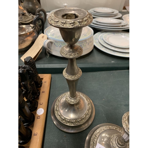 231 - PAIR OF SILVER PLATED CANDLESTICKS