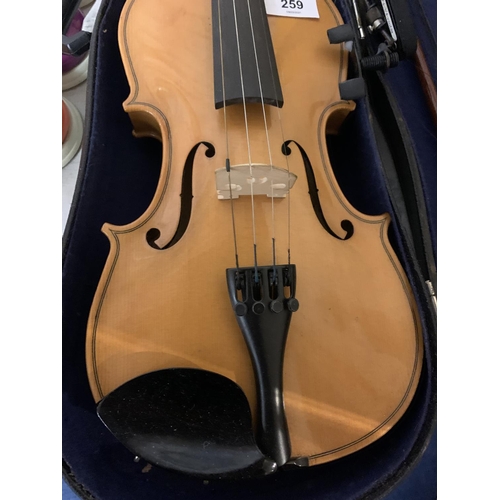 259 - A HALF CASE VIOLIN TO INCLUDE CHIN REST AND BOW