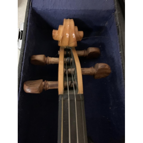 259 - A HALF CASE VIOLIN TO INCLUDE CHIN REST AND BOW