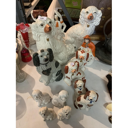 296 - A LARGE COLLECTION OF STAFFORDSHIRE DOGS AND FIGURES