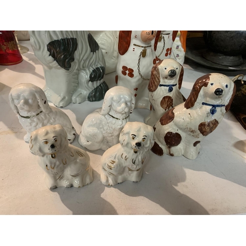 296 - A LARGE COLLECTION OF STAFFORDSHIRE DOGS AND FIGURES