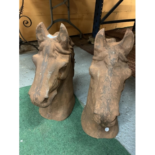 35A - A PAIR OF LARGE CAST (IN THE TERRACOTTA STYLE) HORSES HEADS H:47CM