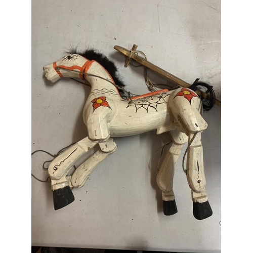 38 - A VINTAGE PAINTED WOODEN STRING PUPPET IN THE FORM OF A HORSE
