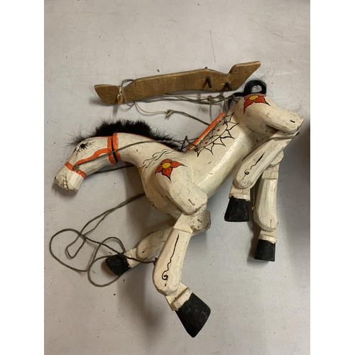 38 - A VINTAGE PAINTED WOODEN STRING PUPPET IN THE FORM OF A HORSE