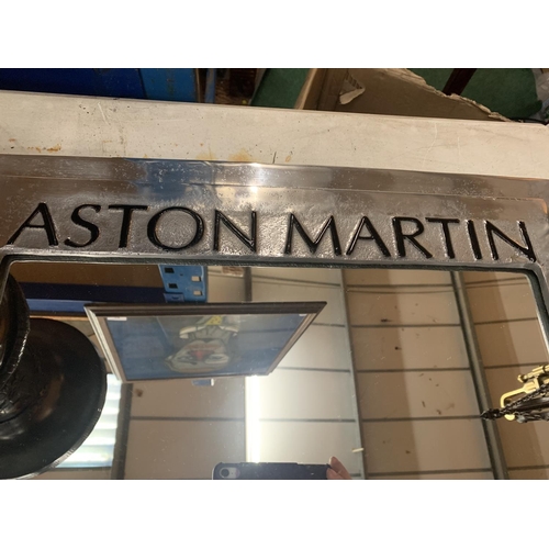 4 - A LARGE CHROME 'ASTON MARTIN' MIRROR - 61CM X 50CM