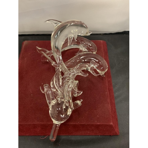 58 - TWO CRYSTAL GLASS SCULPTURES BY BONILLA, ONE IN THE FORM OF A STAG THE OTHER A TRIO OF DOLPHINS