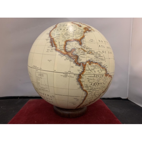 69 - A GLOBE ON WOODEN BASE