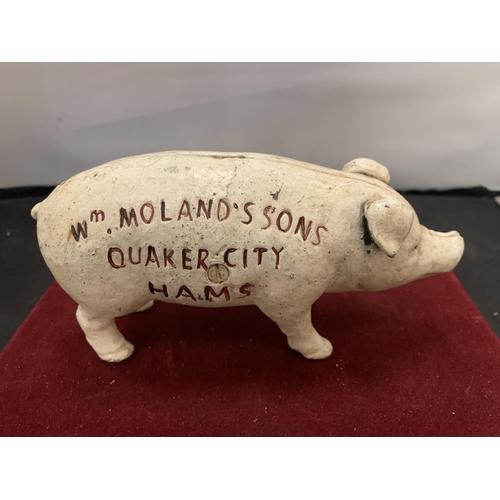 76 - A CAST MONEY BOX IN THE FORM OF A PIG ' WM MOLAND'S SONS ...'