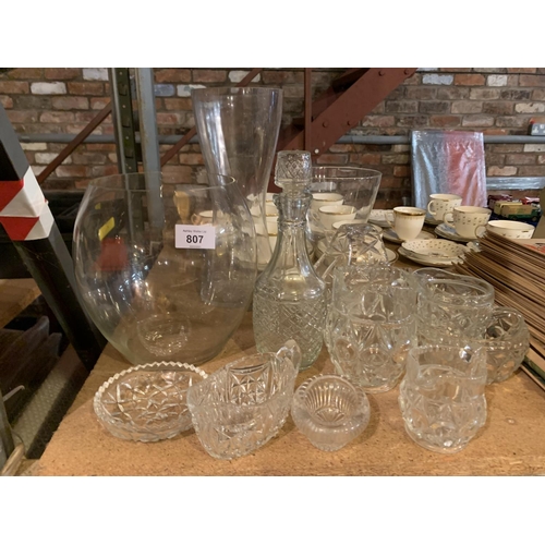 807 - AN ASSORTMENT OF GLASS WARE TO INCLUDE CUT GLASS AND THREE MODERN VASES