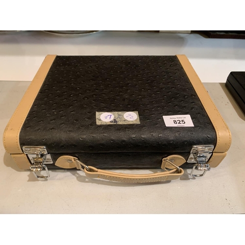 825 - A FAUX LEATHER CASE CONTAINING A QUANTITY OF COSTUME BROOCHES