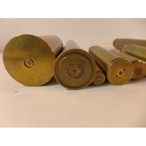 483 - A COLLECTION OF EIGHT BRASS SHELLCASES TO INCLUDE, 20MM DATED 1942, 30MM, 40MM