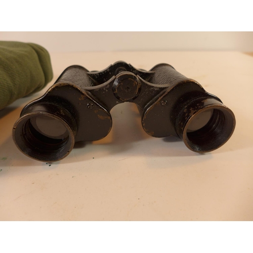 490 - A PAIR OF 1941 TAYLOR-HOBSON X 2 BINOCULARS AND WEBBING CASE, ANOTHER PAIR OF BINOCULARS AND A SPARE... 