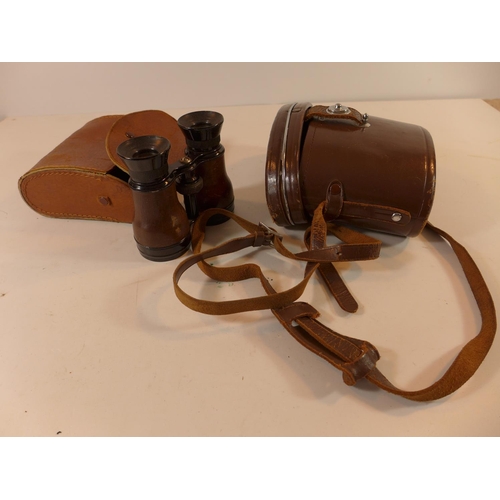 490 - A PAIR OF 1941 TAYLOR-HOBSON X 2 BINOCULARS AND WEBBING CASE, ANOTHER PAIR OF BINOCULARS AND A SPARE... 