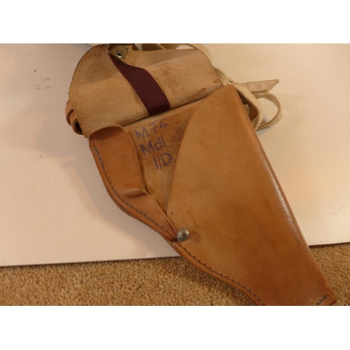 494 - A LEATHER SHOULDER HOLSTER AND MAZINE POUCH AND A FURTHER LEATHER HOLSTER (3)