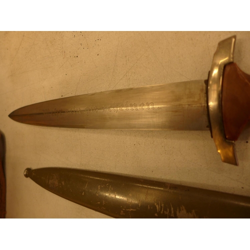 521 - A GERMAN MID 20TH CENTURY NPEA DAGGER, 22CM BLADE WITH INSCRIPTION, COMPLETE WITH SCABBARD