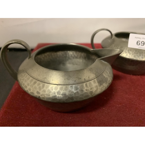 697 - A TUDRIC PEWTER WARE CREAMER AND SUGAR BOWL