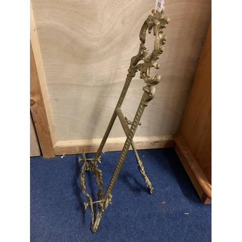 768 - A LARGE BRASS EASEL