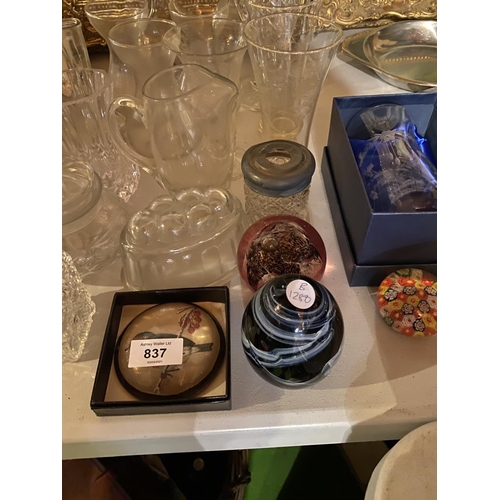 837 - A VARIETY OF GLASSWARE TO INCLUDE A DECANTER, A VASE AND PAPER WEIGHTS ETC