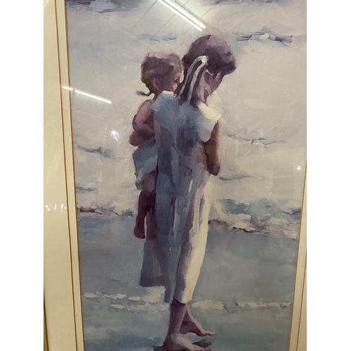 839 - A LARGE FRAMED PRINT OF A MOTHER AND CHILD ON THE SHORELINE (BACK A/F)