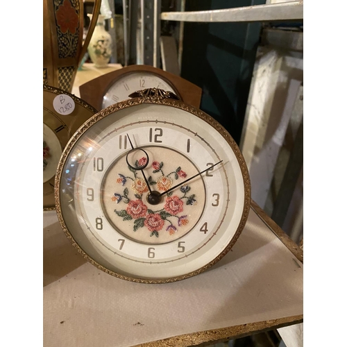 843 - FOUR CLOCKS AND A QUANTITY OF CHINA TO INCLUDE A CAVERSWALL URN