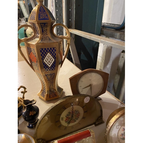 843 - FOUR CLOCKS AND A QUANTITY OF CHINA TO INCLUDE A CAVERSWALL URN