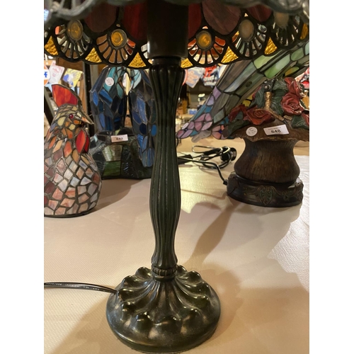 851 - A TIFFANY STYLE BEDSIDE LAMP WITH METAL BASE