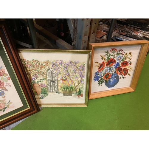 869 - A QUANTITY OF FRAMED TAPESTRIES