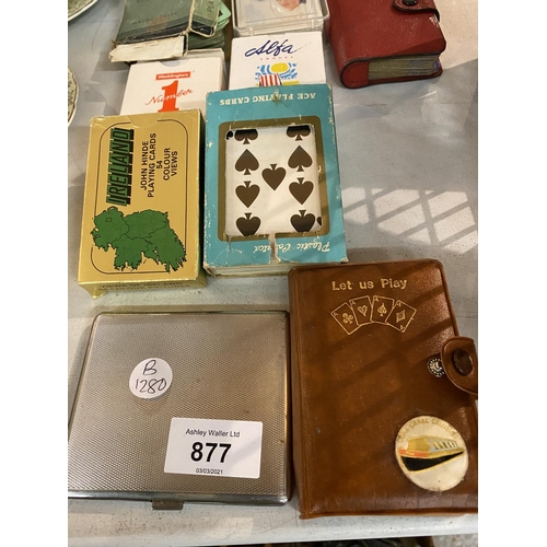 877 - A VARIETY OF DECKS OF CARDS TO ALSO INCLUDE A WHITE METAL CIGARETTE CASE