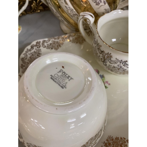 881 - AN ASSORTMENT OF VINTAGE CHINA TEA WARE TO INCLUDE SIX FOLEY TRIOS, A SADLER TEAPOT AND A FURTHER FO... 