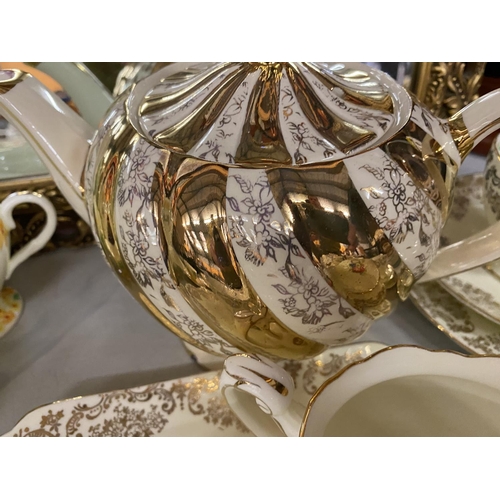 881 - AN ASSORTMENT OF VINTAGE CHINA TEA WARE TO INCLUDE SIX FOLEY TRIOS, A SADLER TEAPOT AND A FURTHER FO... 