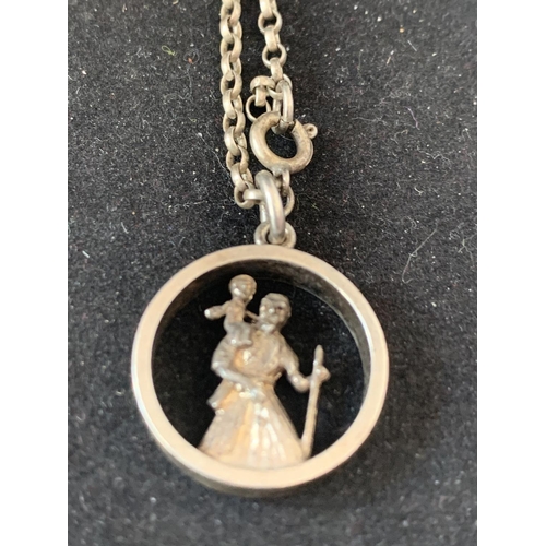 620 - TWO UNUSUAL SILVER ST CHRISTOPHER PENDANTS