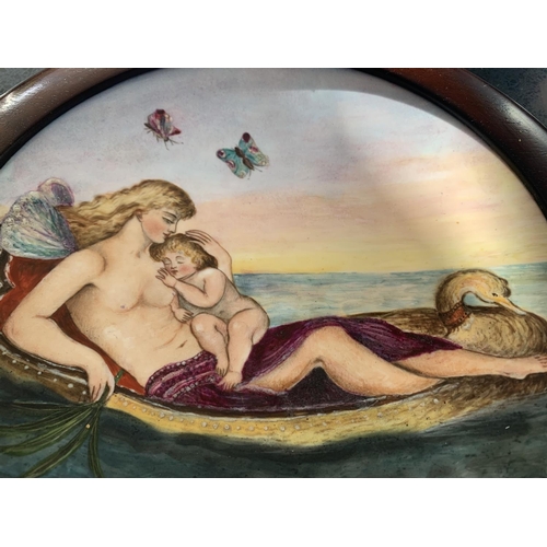 721 - A WOODEN FRAMED CIRCULAR MINTON PLAQUE BY LUCIEN BOULLEMIER OF A MOTHER AND CHILD ON A GONDALA