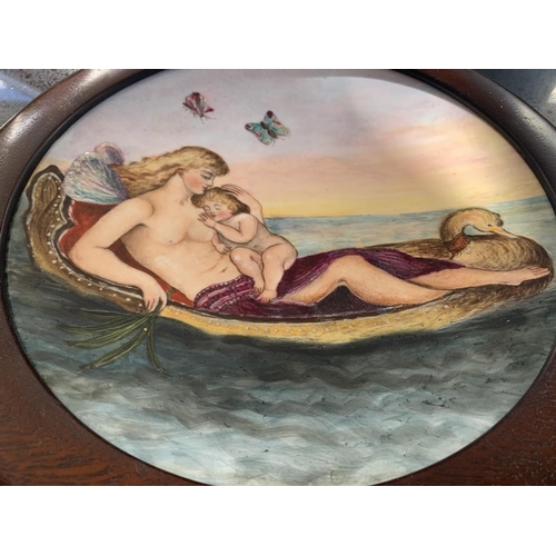 721 - A WOODEN FRAMED CIRCULAR MINTON PLAQUE BY LUCIEN BOULLEMIER OF A MOTHER AND CHILD ON A GONDALA