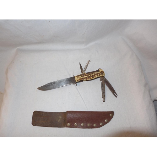 445 - A SOLINGEN BLADED COMBINATION BOWIE KNIFE, 12.5CM BLADE, GRIP WITH INTEGRAL CORKSCREW, FILE ETC