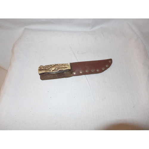 445 - A SOLINGEN BLADED COMBINATION BOWIE KNIFE, 12.5CM BLADE, GRIP WITH INTEGRAL CORKSCREW, FILE ETC