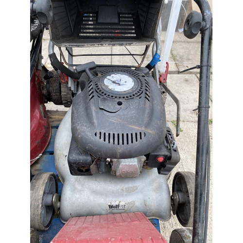 12 - FOUR LAWN MOWERS - A MOUNTFIELD WITH 4.5 HONDA ENGINE, A MOUNTFIELD HP470 WITH B & S ENGINE
A WOLF G... 