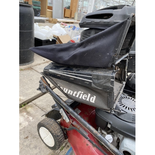 12 - FOUR LAWN MOWERS - A MOUNTFIELD WITH 4.5 HONDA ENGINE, A MOUNTFIELD HP470 WITH B & S ENGINE
A WOLF G... 