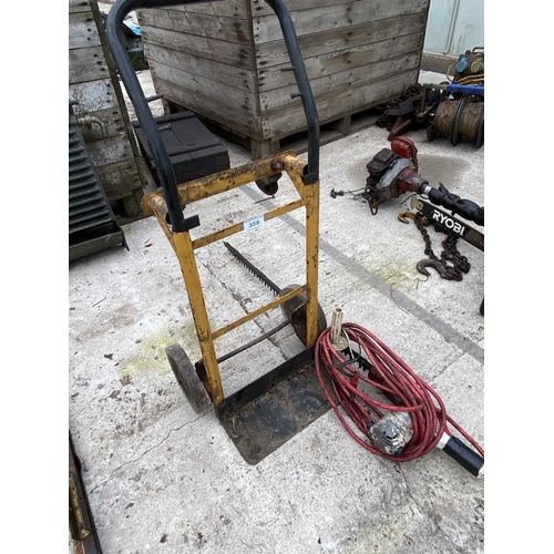 358 - A SMALL TROLLEY AND A 12 VOLT HEDGE CUTTER - NO VAT