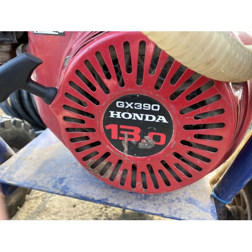 42 - A MOBILE PRESSURE WASHER 6X390 WITH HONDA 130 ENGINE WITH HOSE AND REEL.  - NO VAT