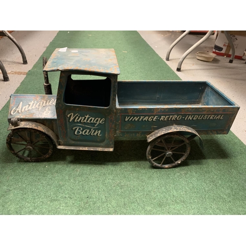 302 - A TIN PLATE VINTAGE STYLE TRUCK - L:67CM H:32CM (TO TOP OF CAB)