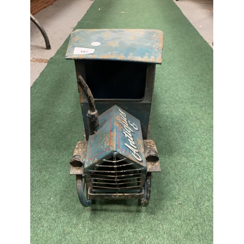 302 - A TIN PLATE VINTAGE STYLE TRUCK - L:67CM H:32CM (TO TOP OF CAB)