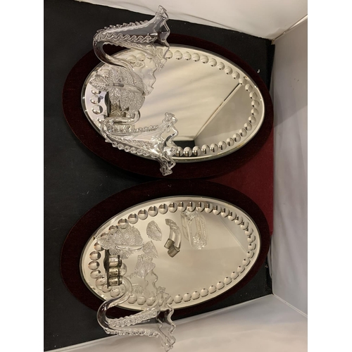 33 - A PAIR OF OVAL MIRRORS WITH VELVET BACKGROUND AND GLASS SCONCE DETAIL (A/F)