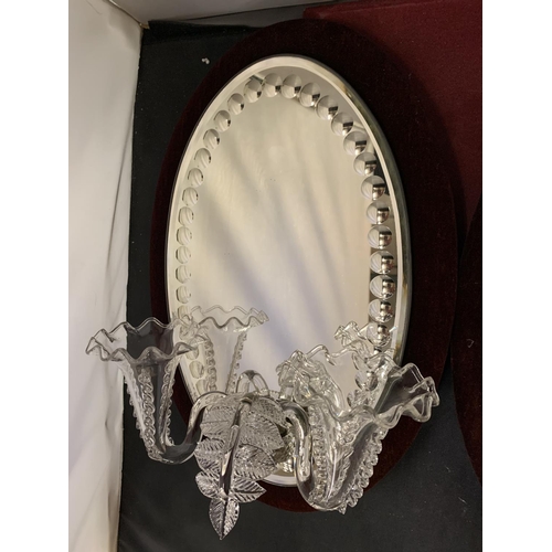 33 - A PAIR OF OVAL MIRRORS WITH VELVET BACKGROUND AND GLASS SCONCE DETAIL (A/F)