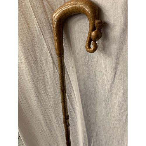 38 - A VINTAGE SHEPHERDS CROOK WITH CARVED THISTLE DETAIL