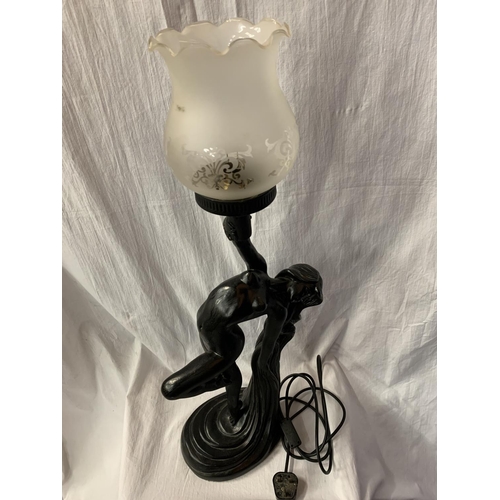 49 - A SPELTER TABLE LAMP IN THE FORM OF A NUDE H:WITH GLASS SHADE 79CM (REPAIR TO HAND)