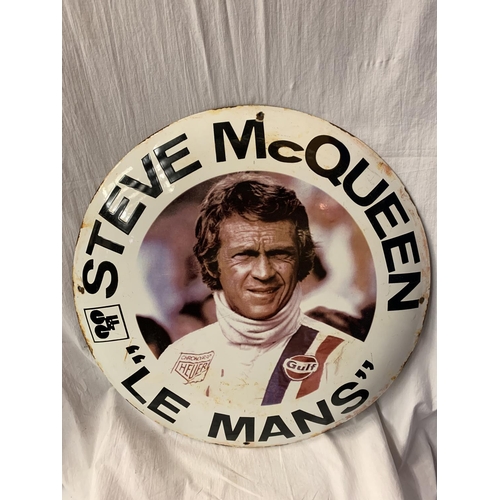 50 - A LARGE ROUND ENAMEL 'STEVE MCQUEEN 