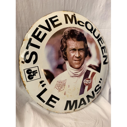 50 - A LARGE ROUND ENAMEL 'STEVE MCQUEEN 